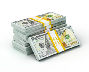 Creative business finance making money concept - stack of new new 100 US dollars 2013 edition banknotes bills bundles isolated on white background money stack on white